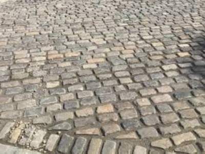 Lincoln Paving Contractors Laying Cobblestones in Lincoln