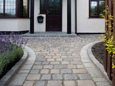 Lincoln Paving Contractors Laying Cobblestones in Lincoln