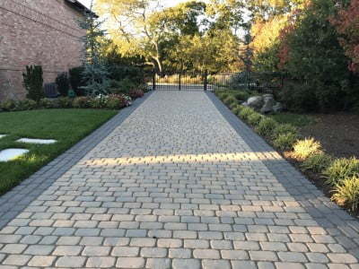 Lincoln Paving Contractors Laying Cobblestones in Lincoln