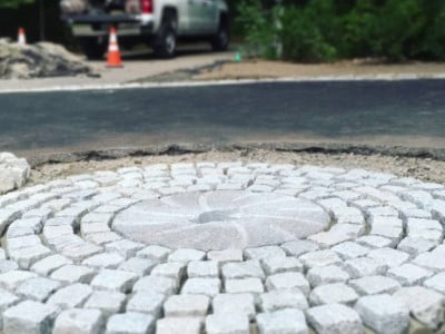 Lincoln Paving Contractors Laying Cobblestones in Lincoln